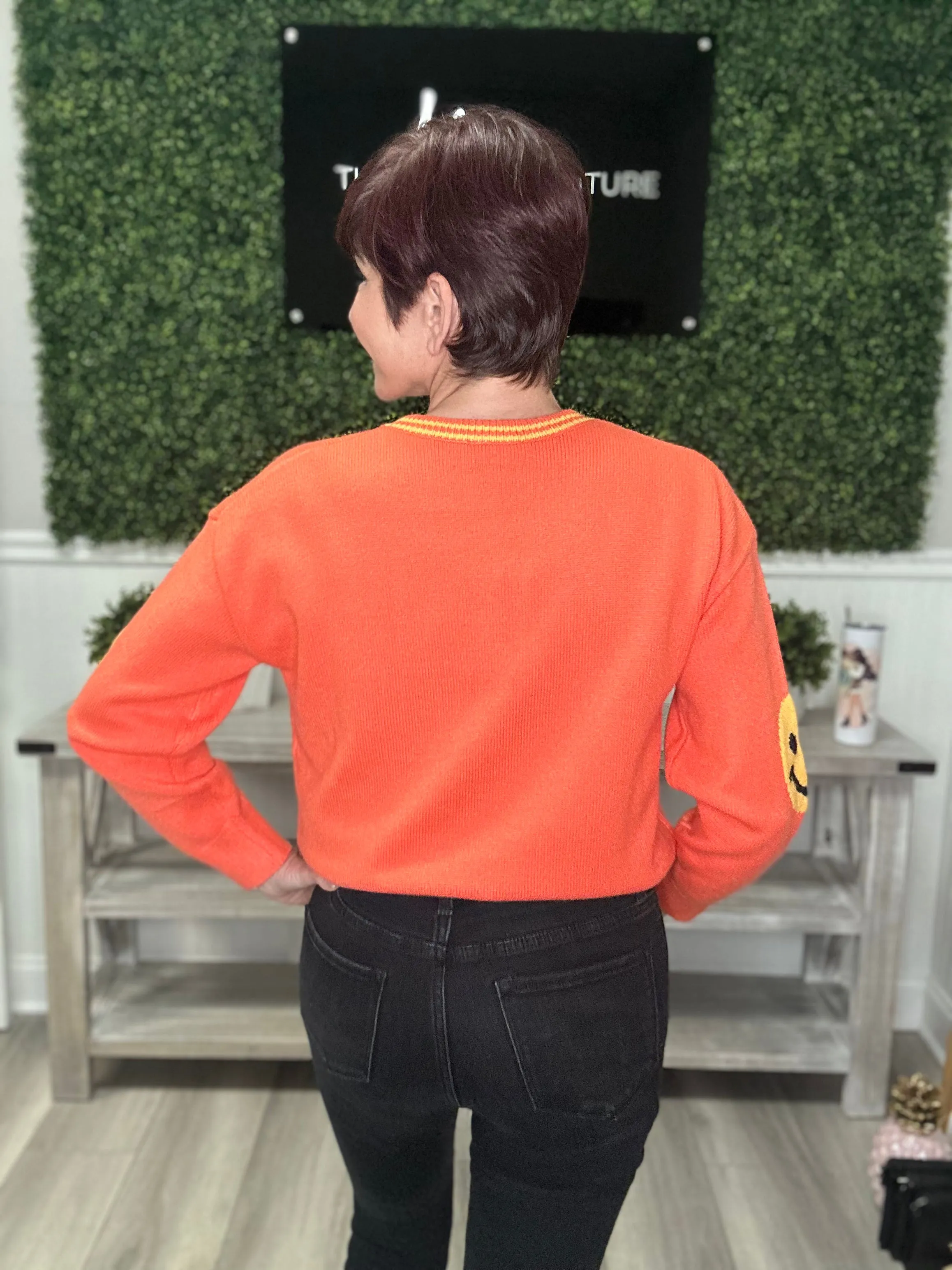 Smiley Sleeve Sweater